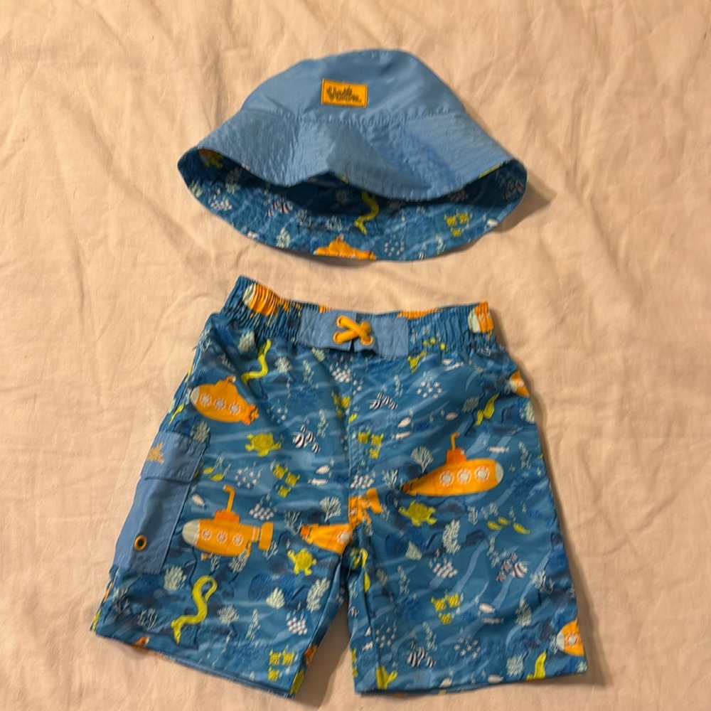 Toddler swim trunks with matching bucket hat